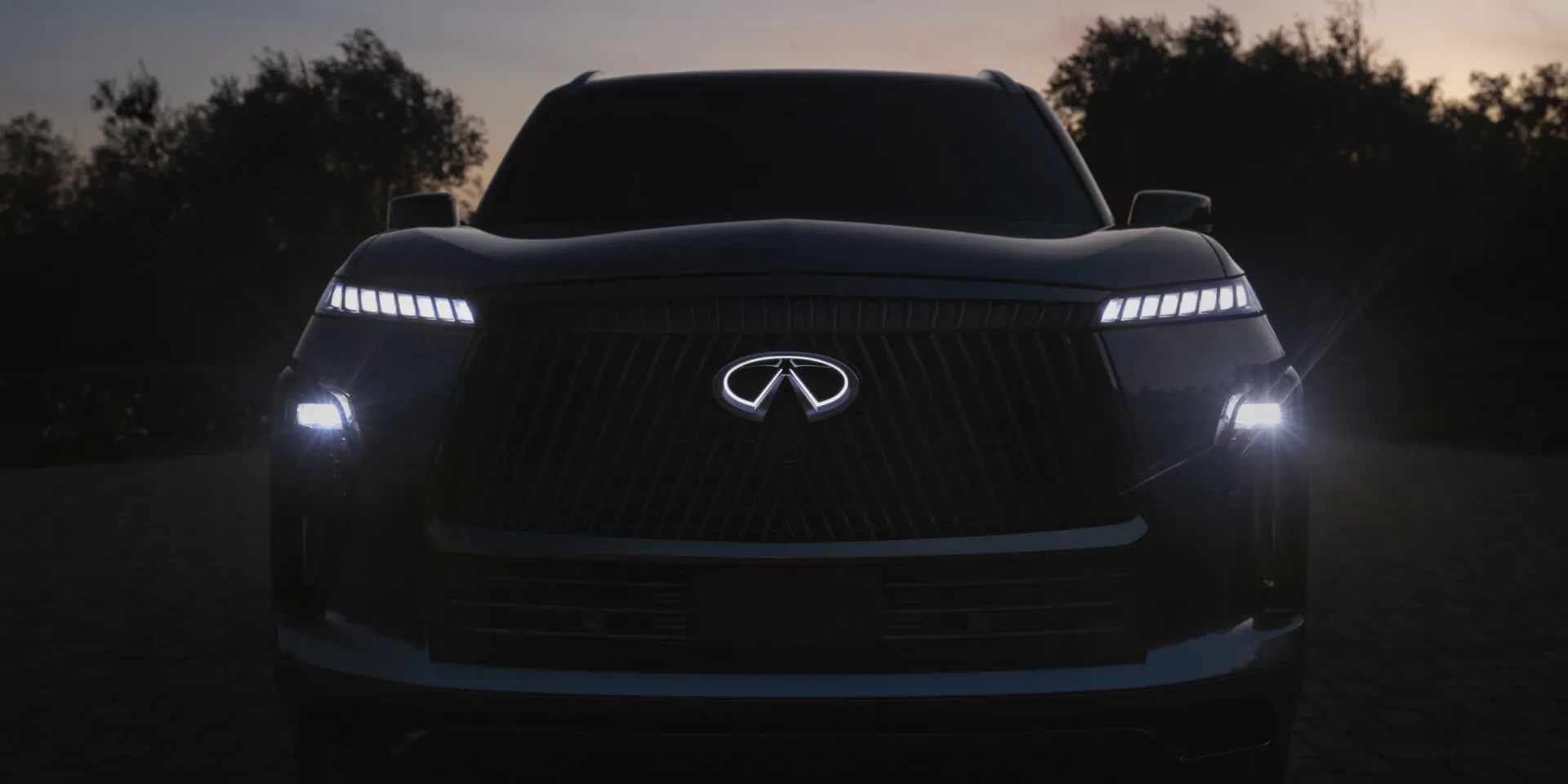 2026 INFINITI QX80 front grille with LED headlights