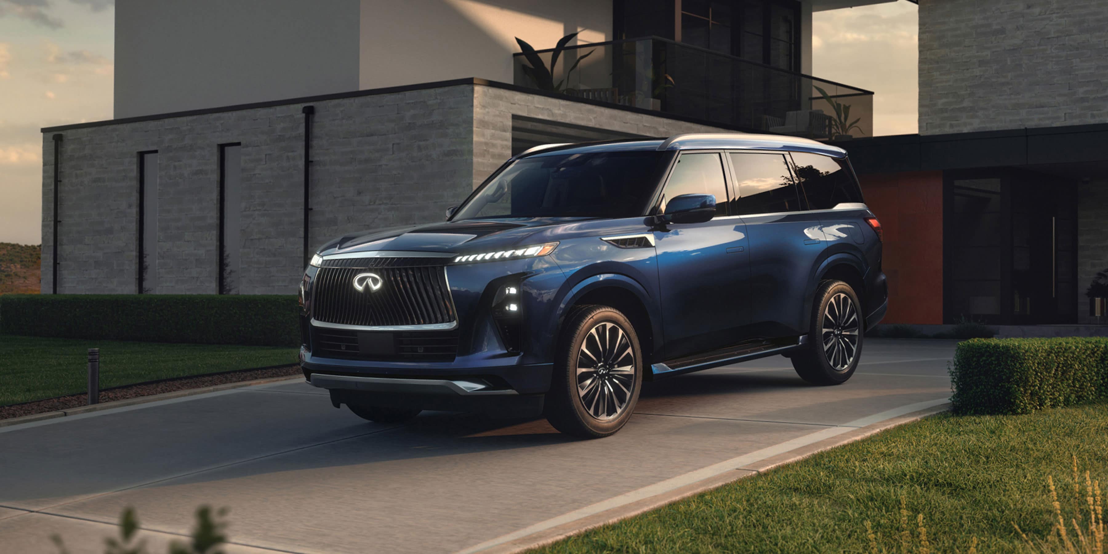 2026 INFINITI QX80 driving on a highway
