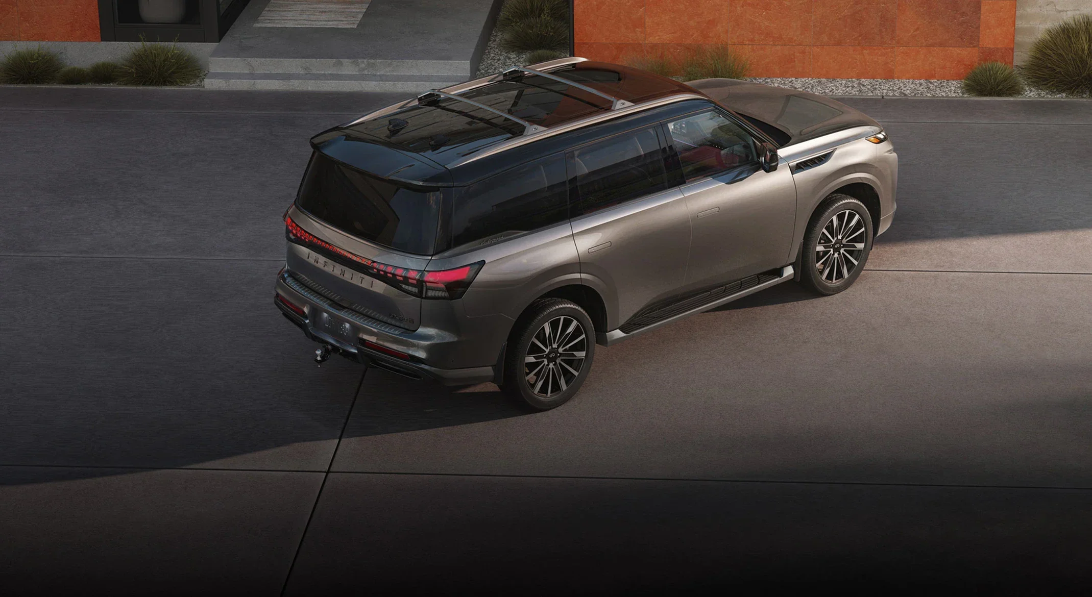 Overhead view of the 2026 INFINITI QX80 in a lot, sized for the Raleigh sports campus